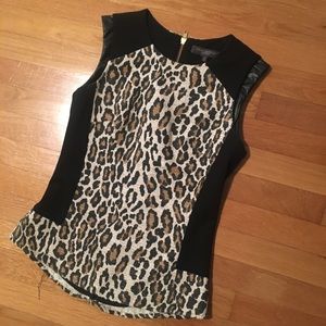 leopard top with leather shoulder details